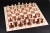 No6_mahogany_sycamore_light_border_notation_chessmen.jpg